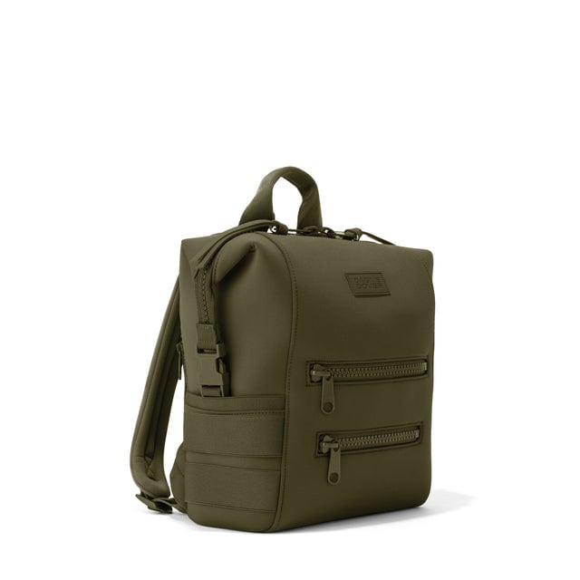 Dagne Dover Small Indi Diaper Backpack in dark green seen from an angle.