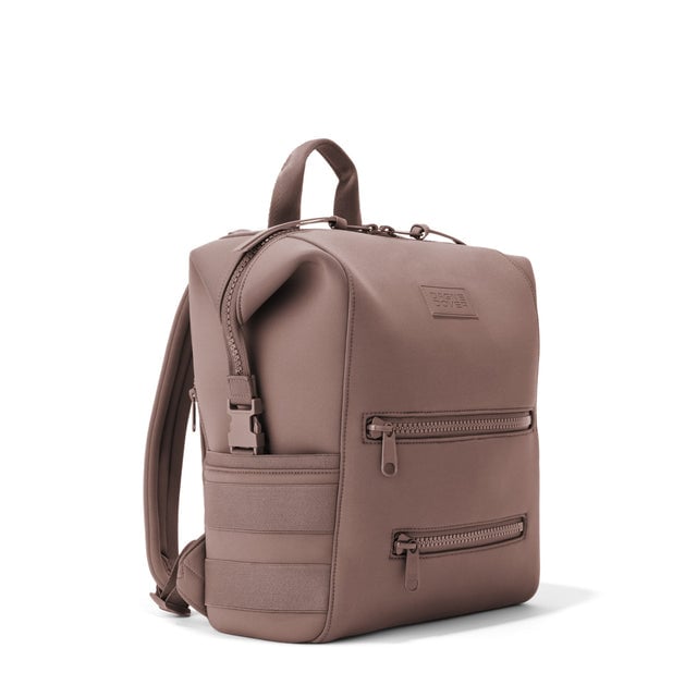 Dagne Dover Medium Indi Diaper Backpack in dune pink seen from an angle.
