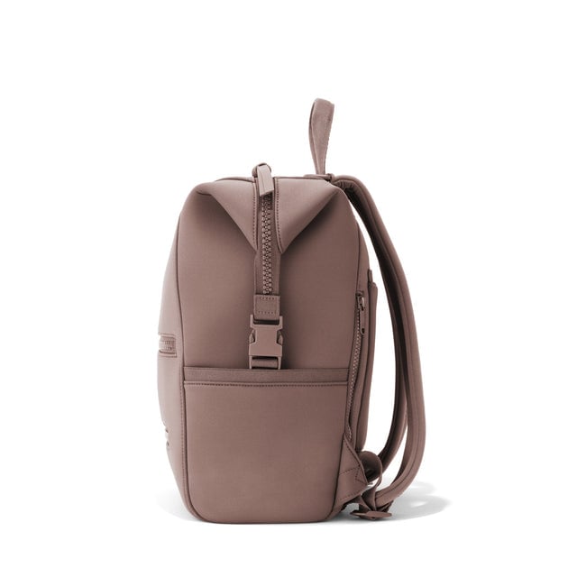 Dagne Dover Medium Indi Diaper Backpack in dune pink seen from the side.