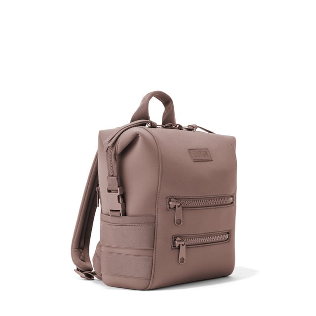 Dagne Dover Small Indi Diaper Backpack in dune pink seen from an angle.