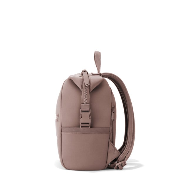 Dagne Dover Small Indi Diaper Backpack in dune pink seen from the side.