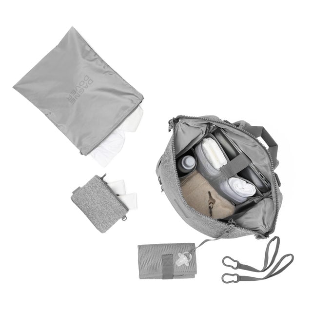 Dagne Dover Large Indi Diaper Backpack in heather grey showing it's water resistant bag, interior pockets, and changing mat.