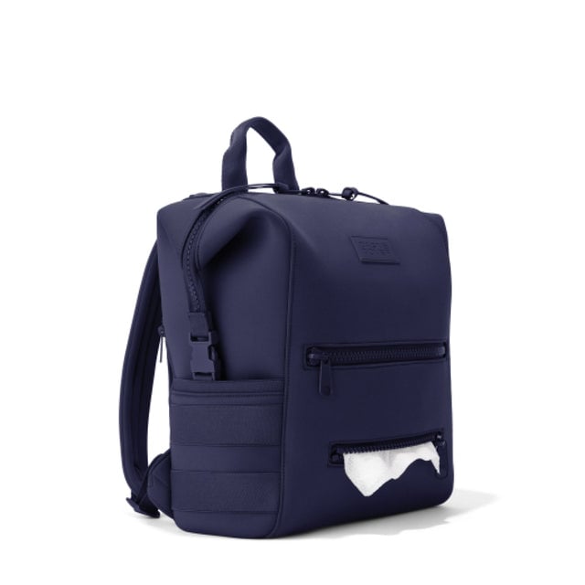Dagne Dover Medium Indi Diaper Backpack in dark blue showing the zipper opening for easy access wipes.