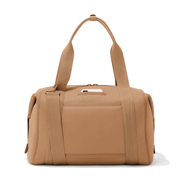 Large Landon Carryall in camel, displaying an exterior phone pocket