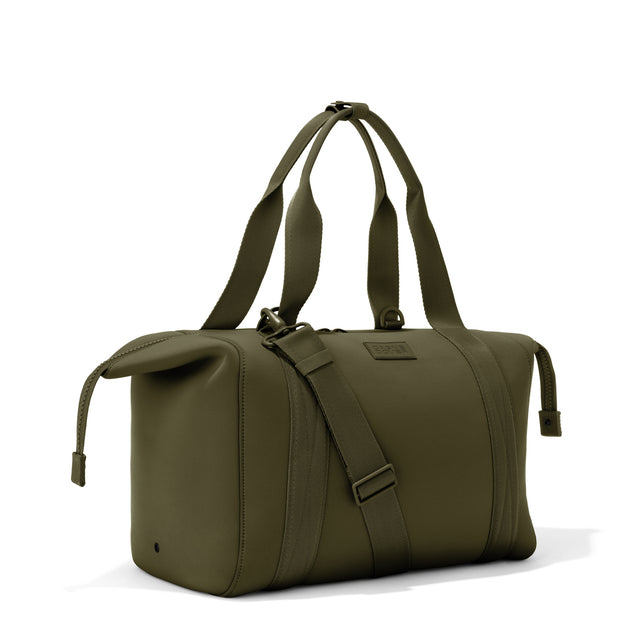Large Landon Carryall in dark green with zippers unbuckled