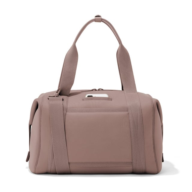 Large Landon Carryall in pink, displaying an exterior phone pocket