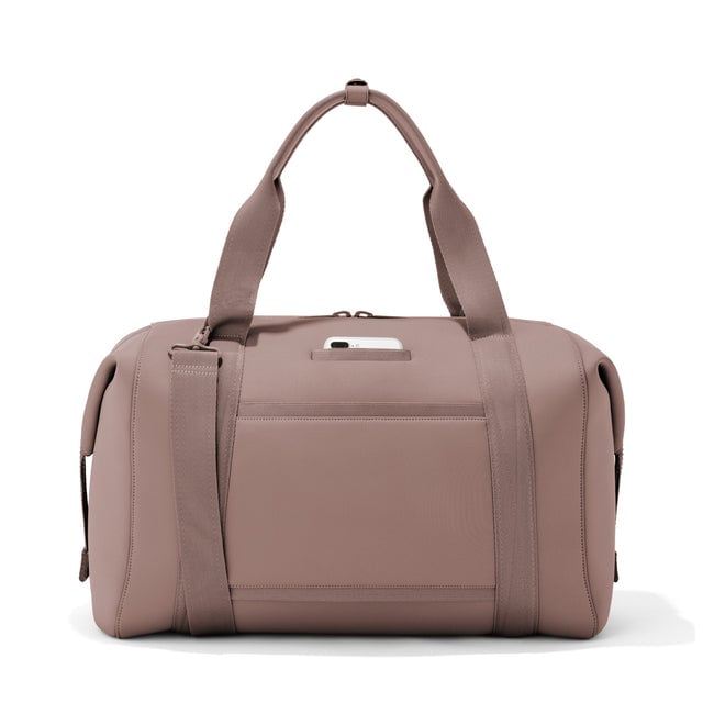 Extra Large Landon Carryall in pink, displaying an exterior phone pocket