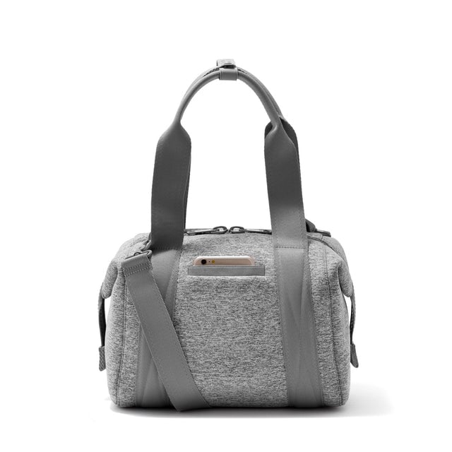 Small Landon Carryall in grey, displaying an exterior phone pocket