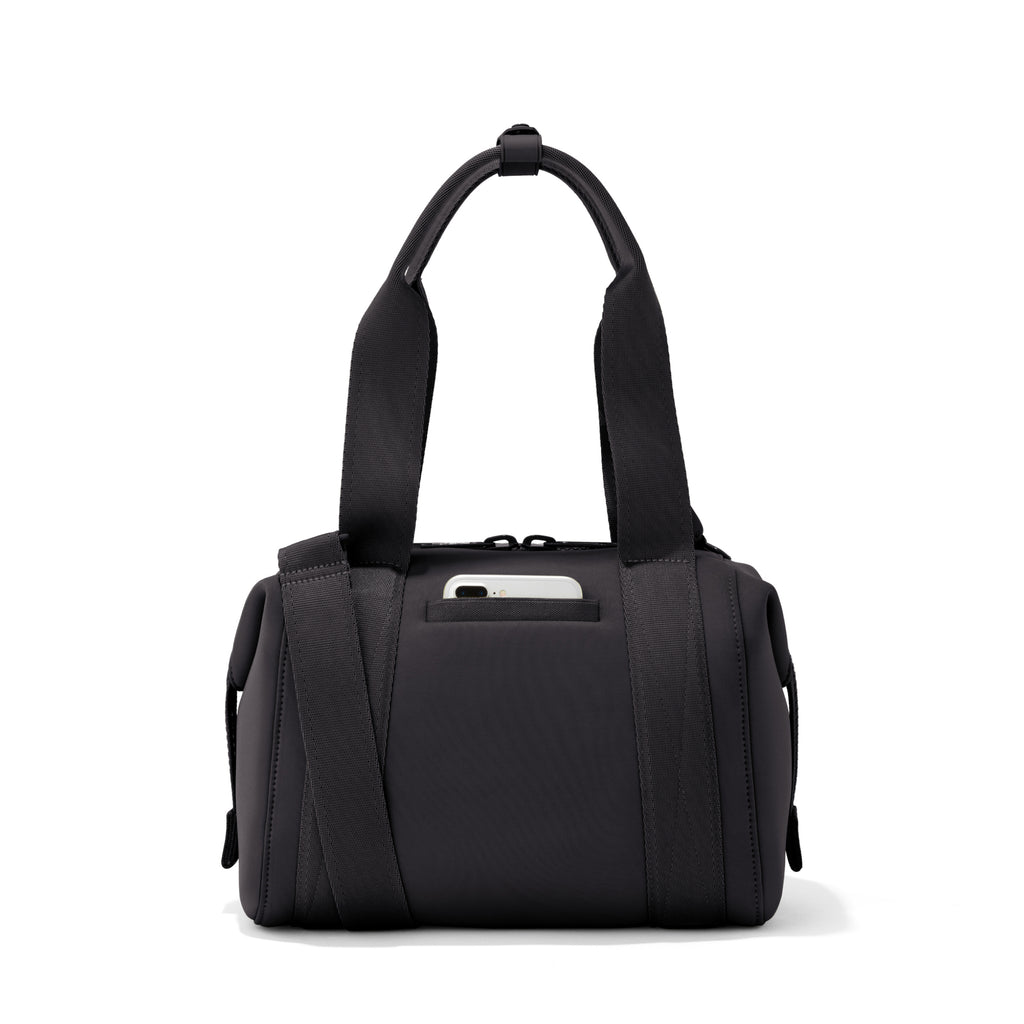 Small Landon Carryall in black, displaying an exterior phone pocket