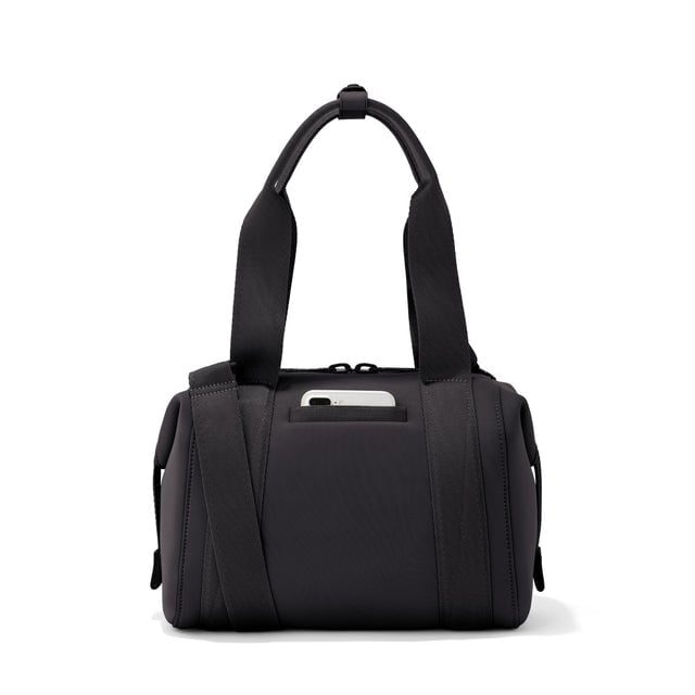Small Landon Carryall in black, displaying an exterior phone pocket