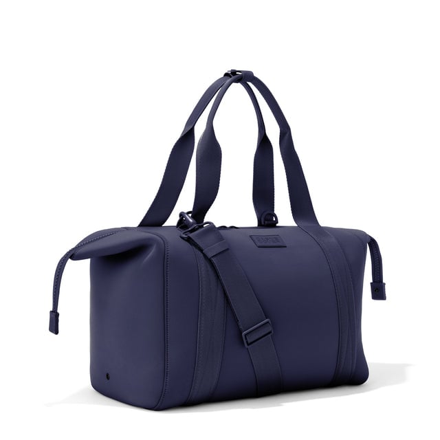 Landon Carryall in  navy blue with zippers unbuckled