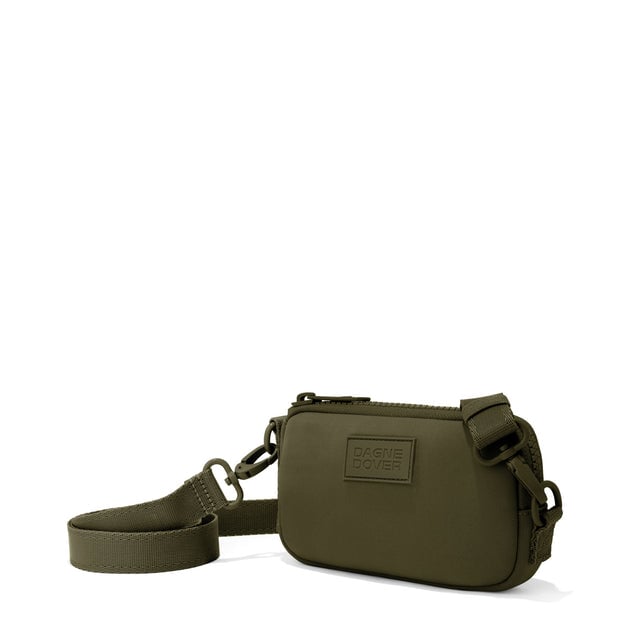 Dagne Dover Mara Phone Sling in dark green seen from an angle, showing the adjustable shoulder strap drop.