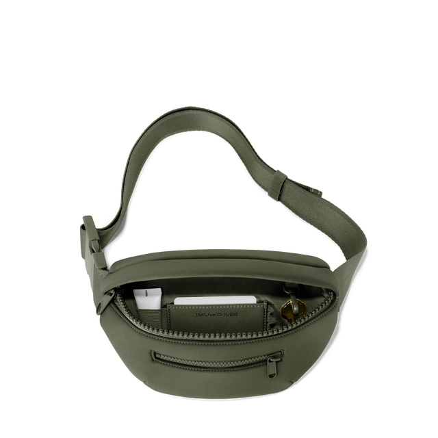Dagne Dover Ace Fanny Pack in a cool green-grey unzipped, exposing the interior pockets. hover NoPDP
