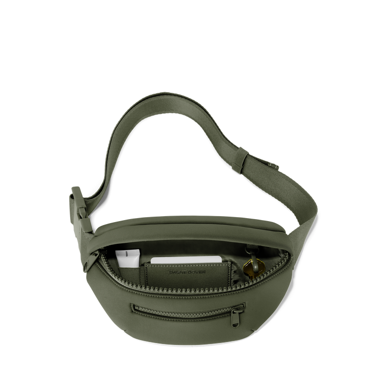 Dagne Dover Ace Fanny Pack in a cool green-grey unzipped, exposing the interior pockets. hover NoPDP