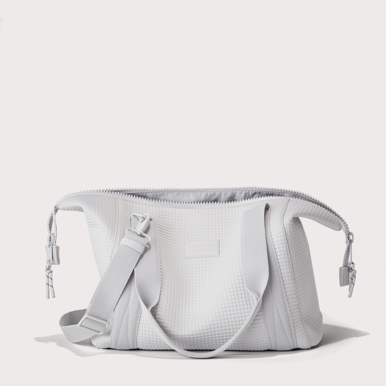 Dagne Dover Medium Landon Carryall in a muted light grey with classic waffle texture unzipped. EDEAE8 .
