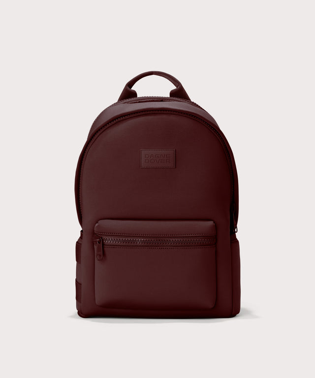 Dagne Dover Large Dakota Neoprene Backpack in a deep brown with purple undertones.