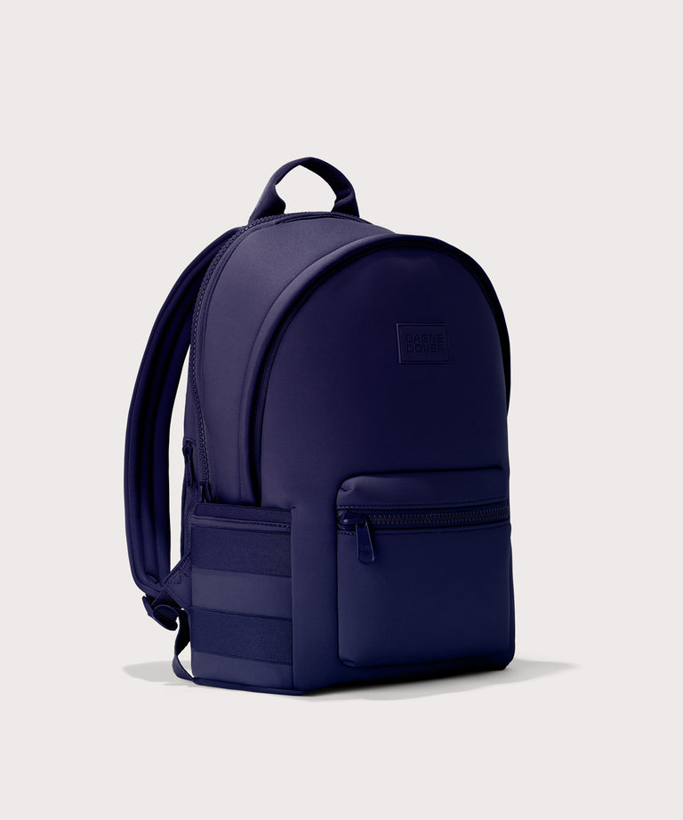 Large Dakota in a jewel-toned, deep blue with strong purple undertones., side angle view
