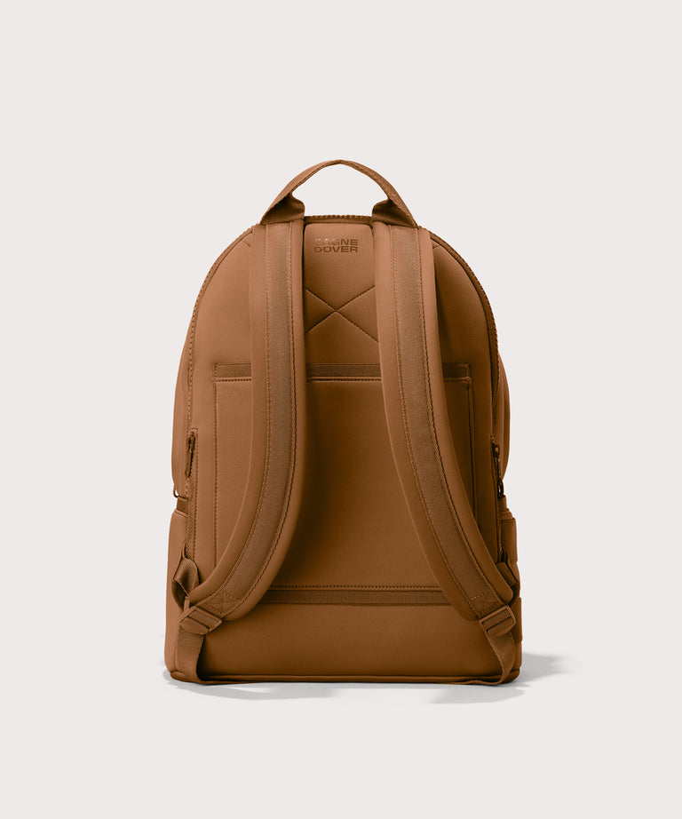 Large Dakota in a saturated, warm medium-brown with burnt orange undertones., displaying an exterior phone pocket. Back view. 
