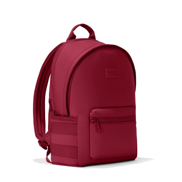Dagne Dover large Dakota Neoprene Backpack in spice red seen from an angle.