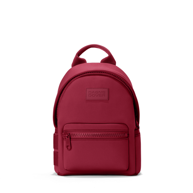 Dagne Dover small Dakota Neoprene Backpack in spice red.
