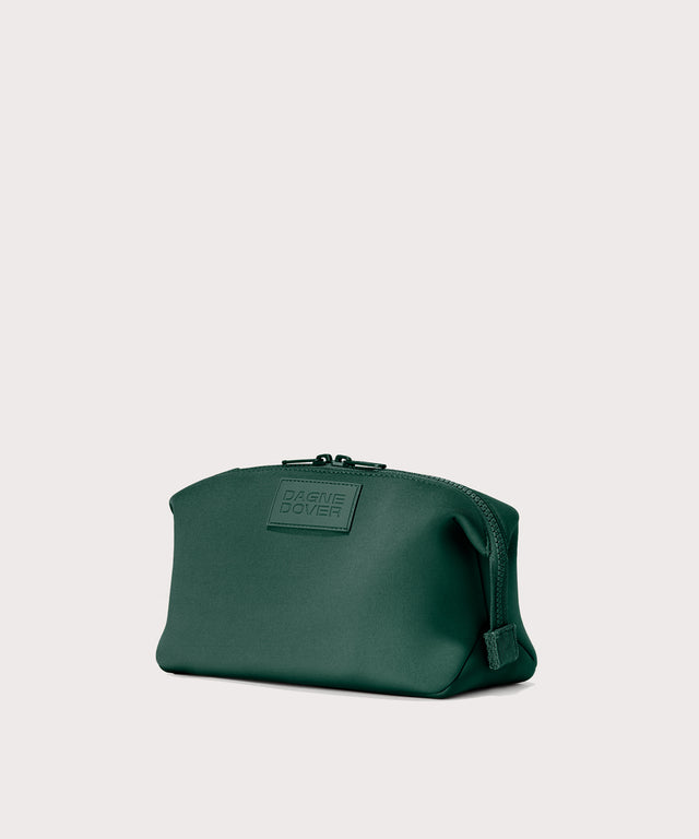 Hunter Large toiletry bag in a saturated, jewel-toned deep green with bold blue undertones, side angle view
