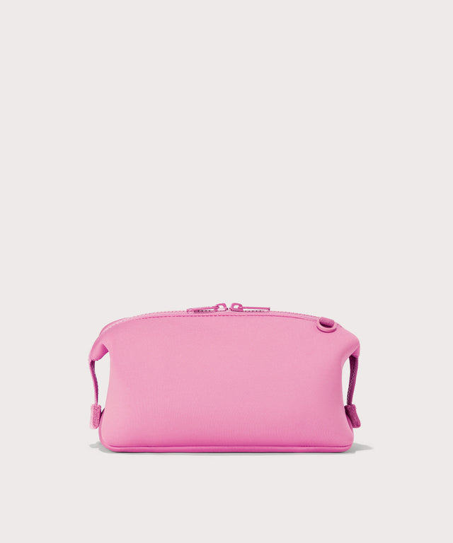 Dagne Dover Large Hunter Toiletry Bag in a true bubble gum pink seen from the back.