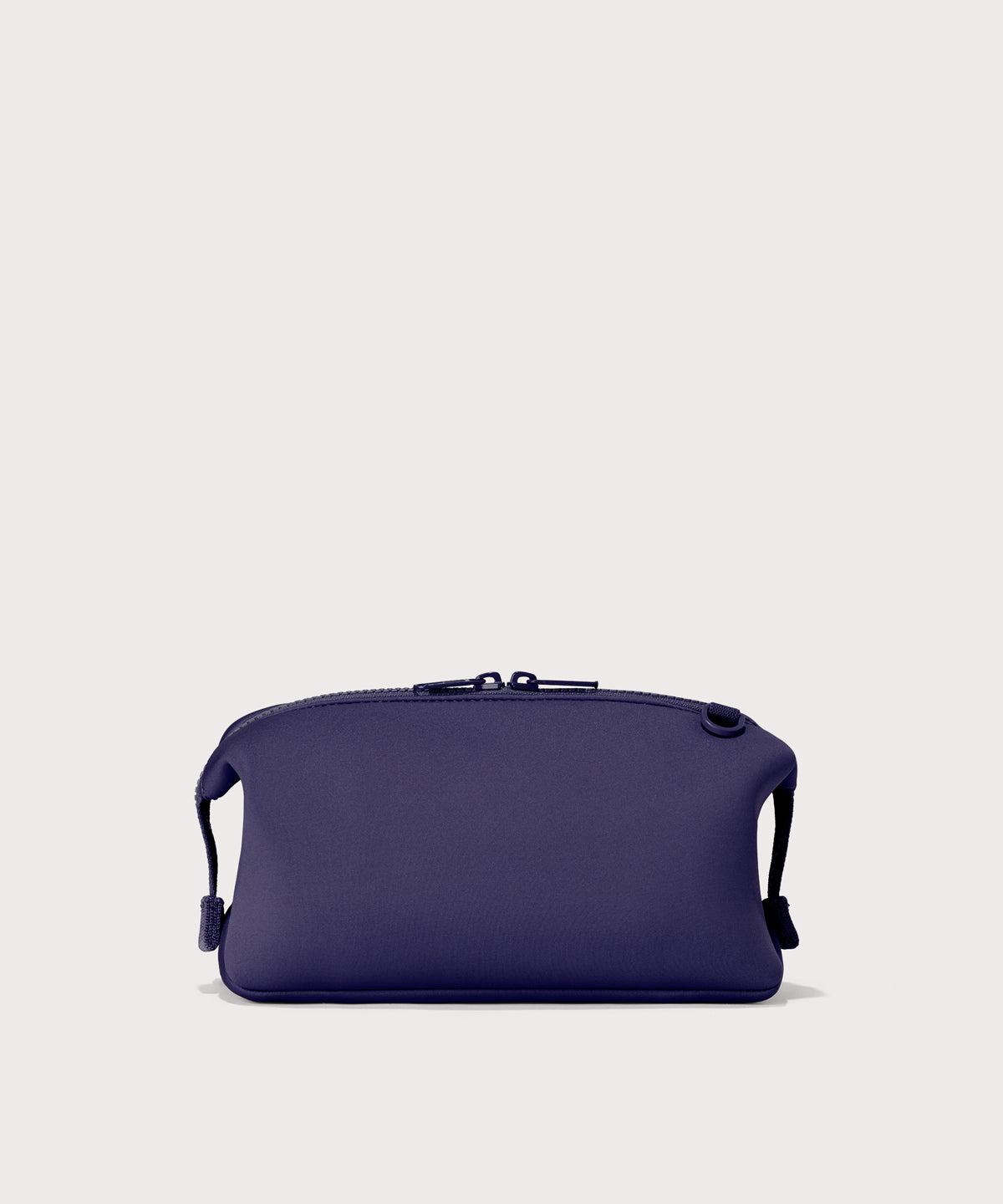 Hunter Large toiletry bag in  a jewel-toned, deep blue with strong purple undertones Back view. 

