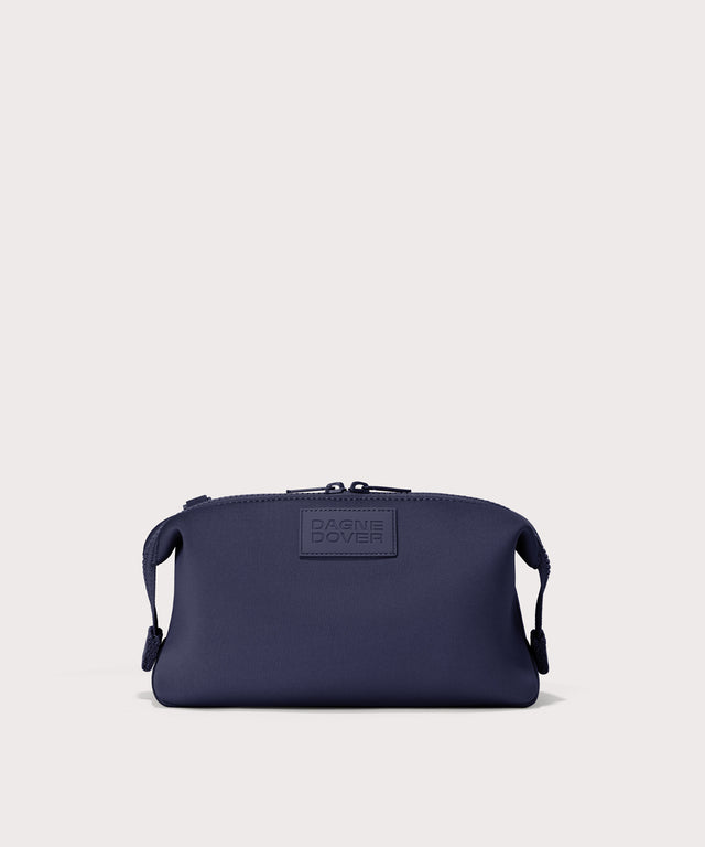 Dagne Dover Large Hunter Toiletry Bag in dark blue.