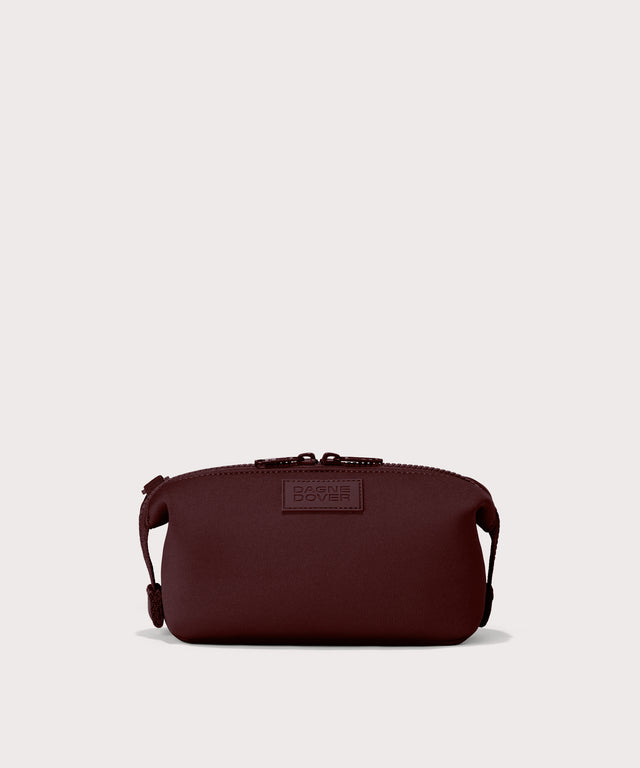 Dagne Dover Small Hunter Toiletry Bag in a deep brown with purple undertones. 