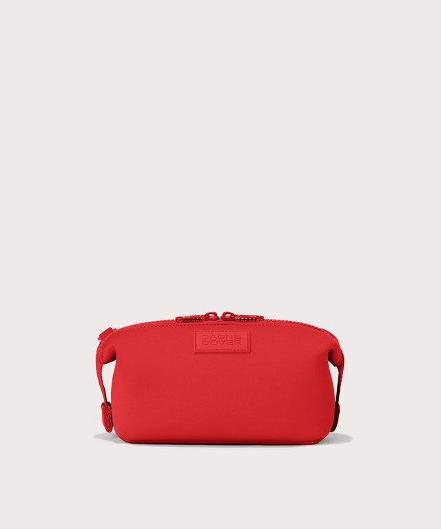 Dagne Dover Small Hunter Toiletry Bag in a fiery, saturated red leaning toward orange.