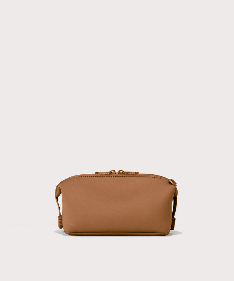 Hunter small toiletry bag in a saturated, warm medium-brown with burnt orange undertones. back view. 
