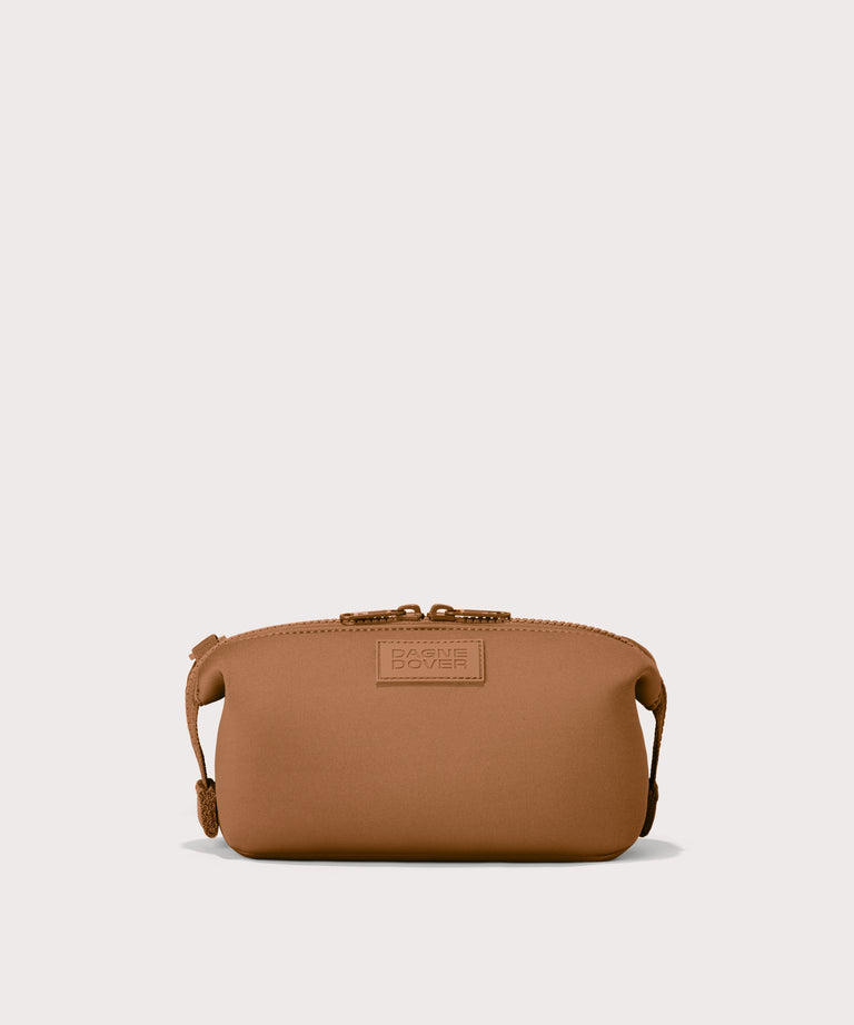 Hunter toiletry bag in a saturated, warm medium-brown with burnt orange undertones. Front view. 