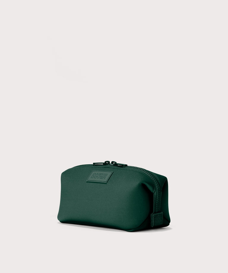 Hunter small toiletry bag in a saturated, jewel-toned deep green with bold blue undertones Angle view. 
