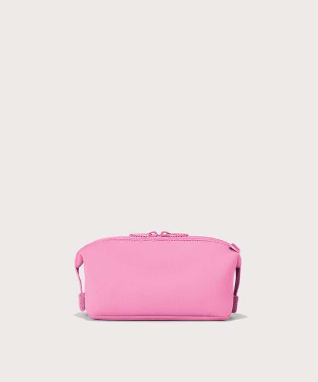 Dagne Dover Small Hunter Toiletry Bag in a true bubble gum pink seen from the back.