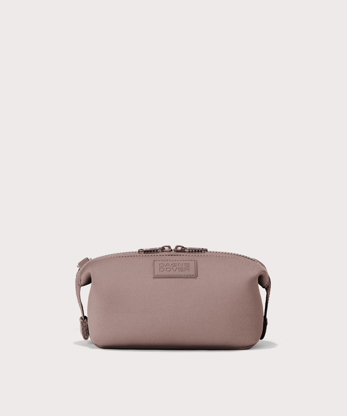 Dagne Dover Small Hunter Toiletry Bag in pink.