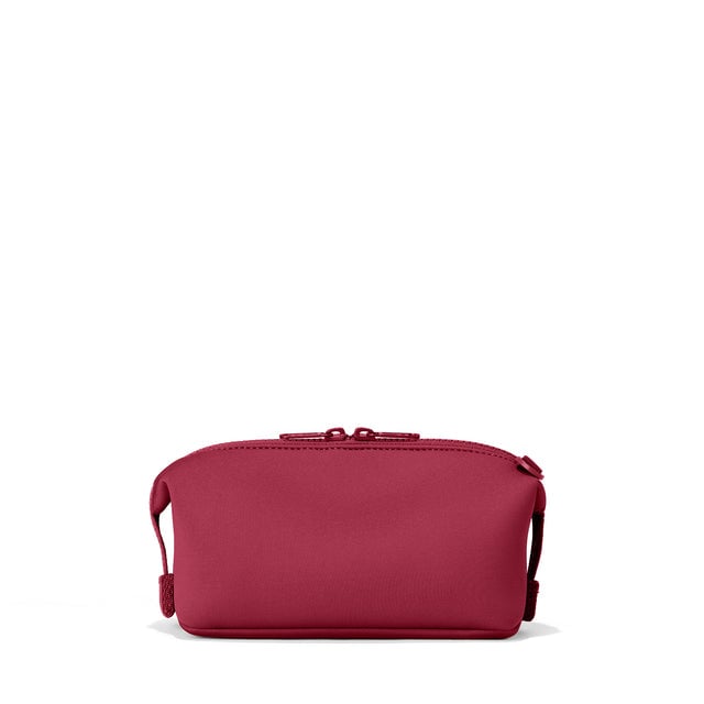 Dagne Dover Small Hunter Toiletry Bag in spice red seen from the back.