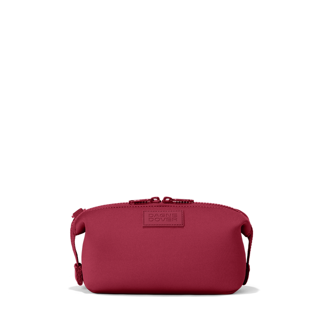 Dagne Dover Small Hunter Toiletry Bag in spice red.