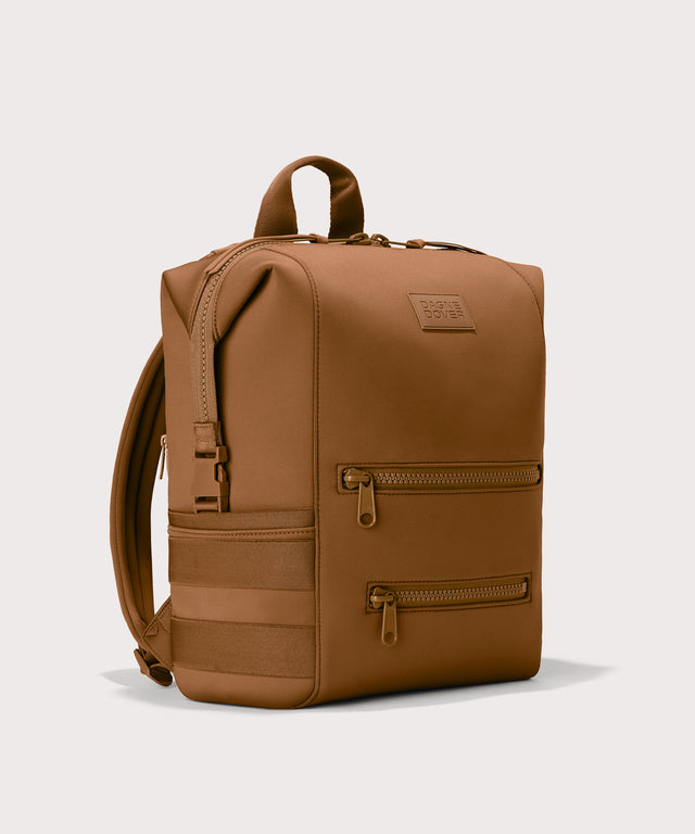 Large Indi backpack in a saturated, warm medium-brown with burnt orange undertones., side angle view
