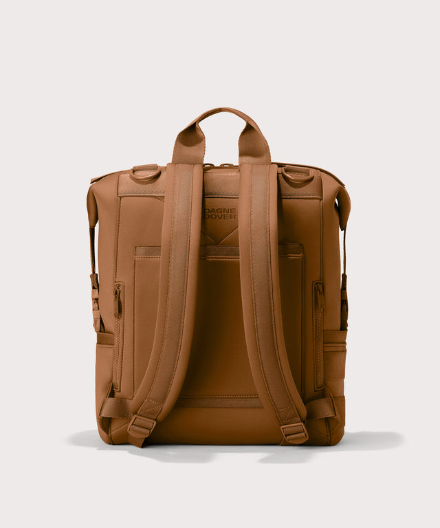Large Indi backpack in a saturated, warm medium-brown with burnt orange undertones. Back view. 

