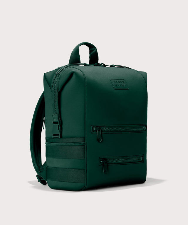 Large Indi backpack in a saturated, jewel-toned deep green with bold blue undertones angle view
