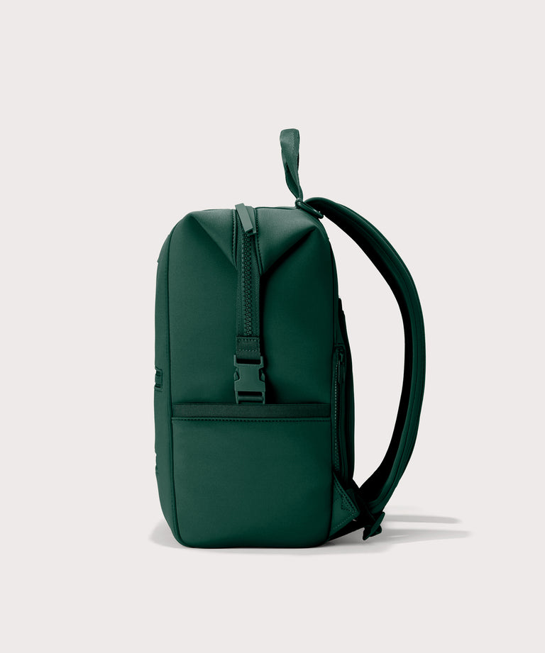 Large Indi backpack in a saturated, jewel-toned deep green with bold blue undertones., side view
