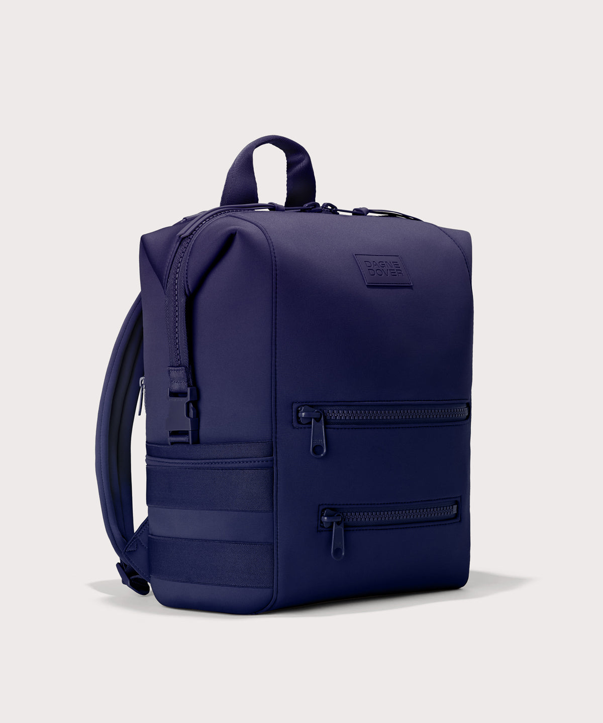 Large Indi backpack in a jewel-toned, deep blue with strong purple undertones., side angle view
