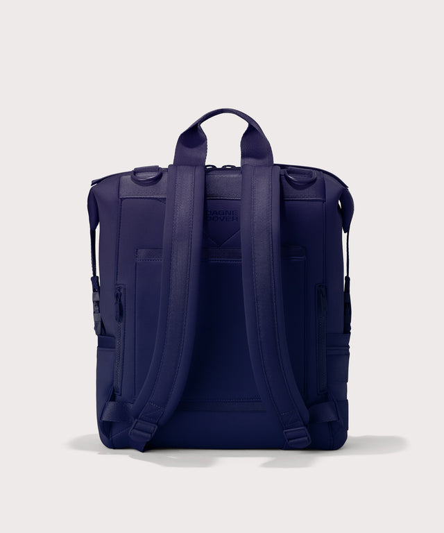 Large Indi backpack in a jewel-toned, deep blue with strong purple undertones. Back view. 
