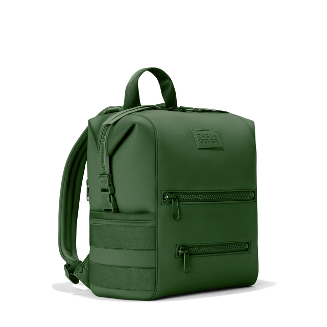 Dagne Dover medium Indi Diaper Backpack in a rich, classic forest green seen from an angle.
