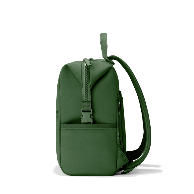 Dagne Dover medium Indi Diaper Backpack in a rich, classic forest green seen from the side.
