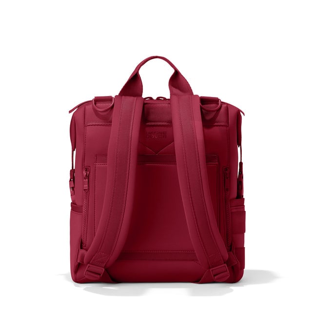 Dagne Dover Medium Indi Diaper Backpack in a punchy, saturated deep red seen from the back.