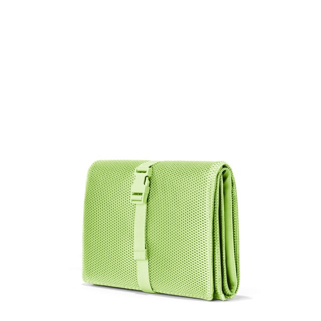 Dagne Dover Joey Changing Kit in matcha green seen from an angle.