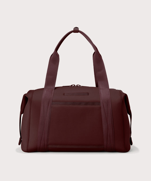 Dagne Dover Large Landon Carryall in a deep brown with purple undertones seen from the back.