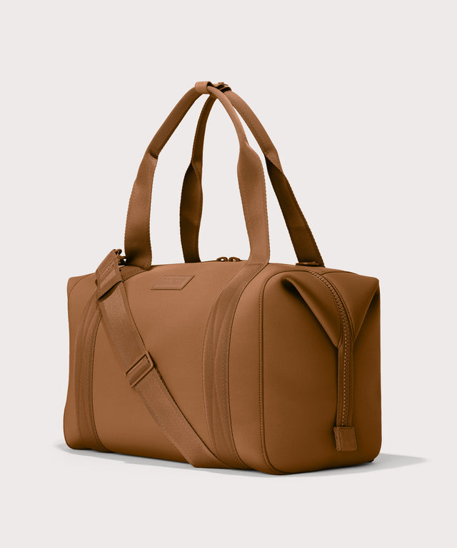 Large Landon Carryall in a a saturated, warm medium-brown with burnt orange undertones, side angle view