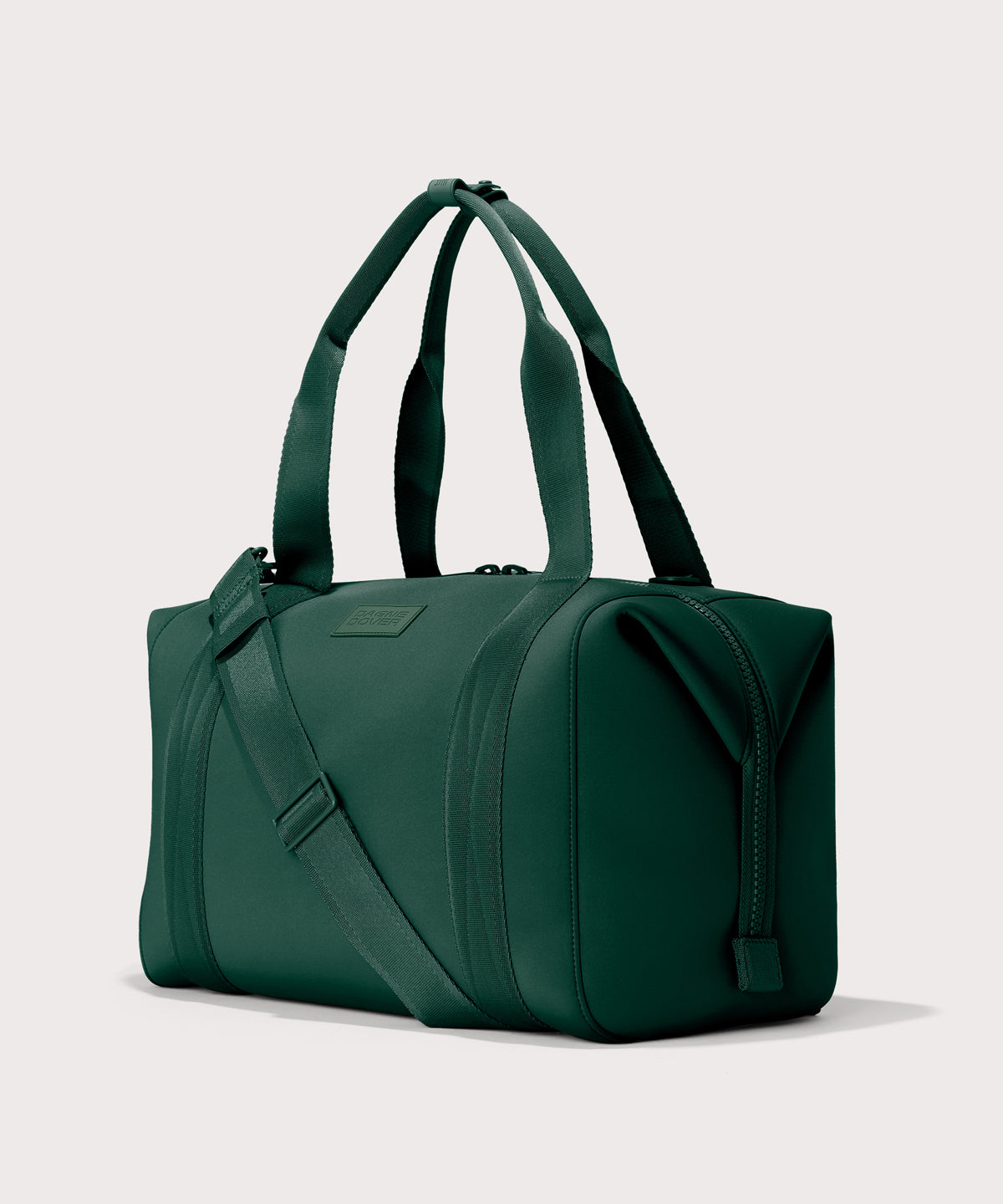Large Landon Carryall in a saturated, jewel-toned deep green with bold blue undertones., side angle view
